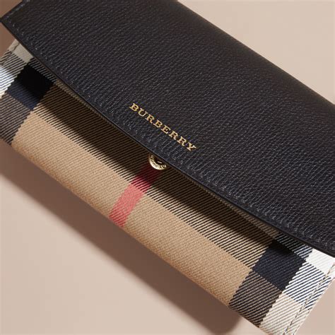 fake burberry continental wallet|burberry black check wallet.